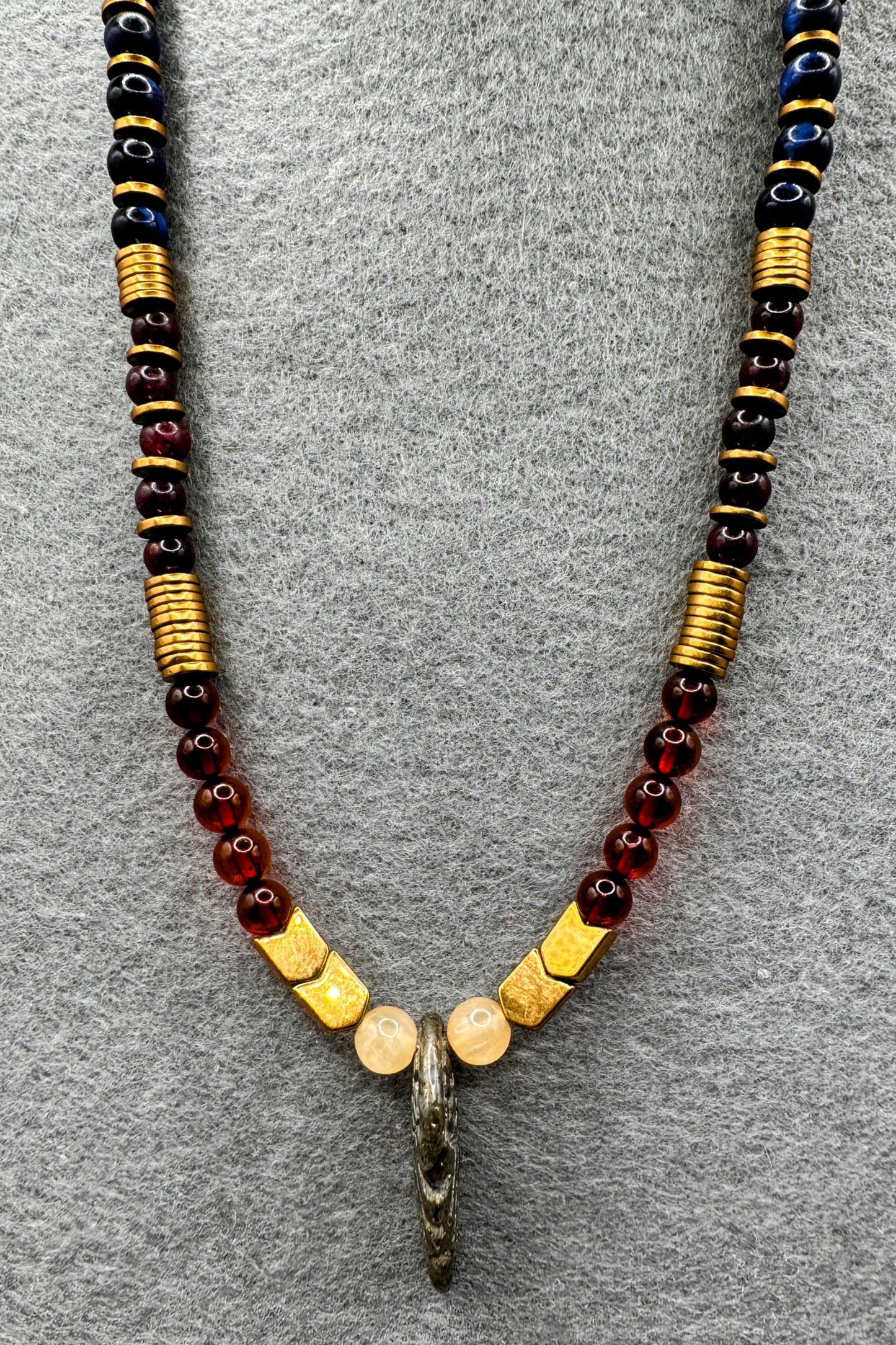 Primal Force of Fire - Baltic Amber, Garnet, Obsidian, Smoky Quartz, and Hawkeye Pendant Necklace